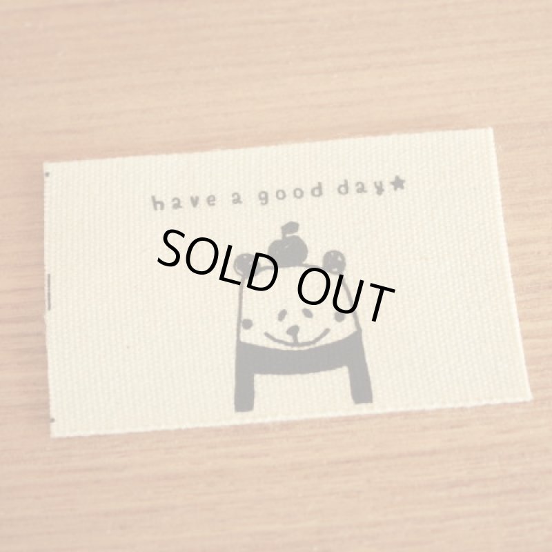 画像1: ばら綿平織32〜35mm横-holidayぱんだとリンゴ(黒) (1)